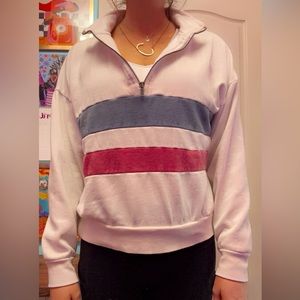 Red, white, and blue half zip sweatshirt.